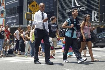 Pedestrians texting and walking